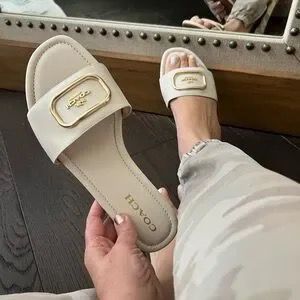 Classy Coach Flats